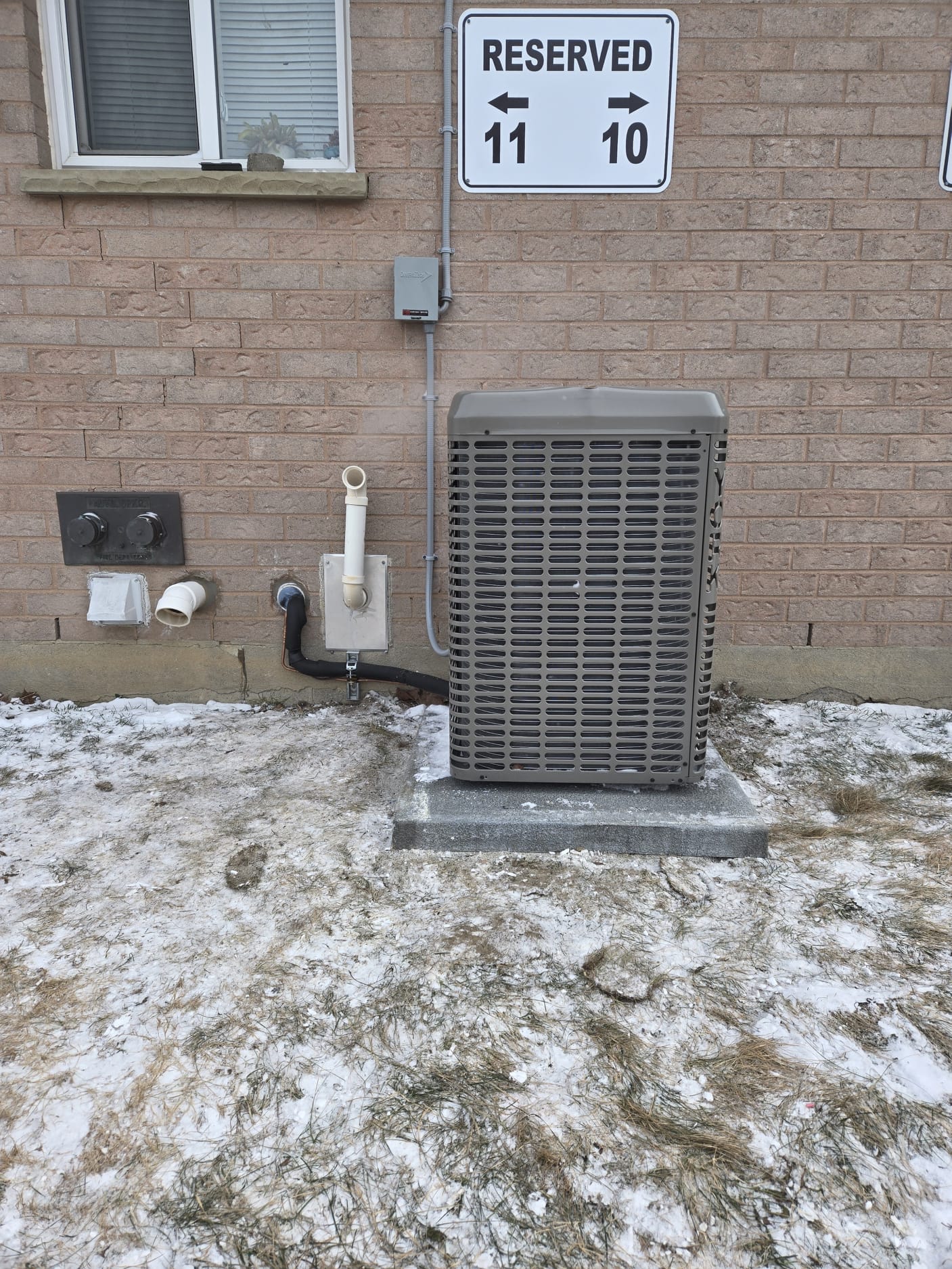 Air conditioner installation outside a home