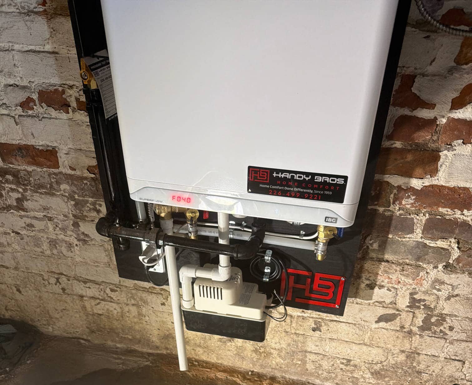 Tankless water heater installed inside a home