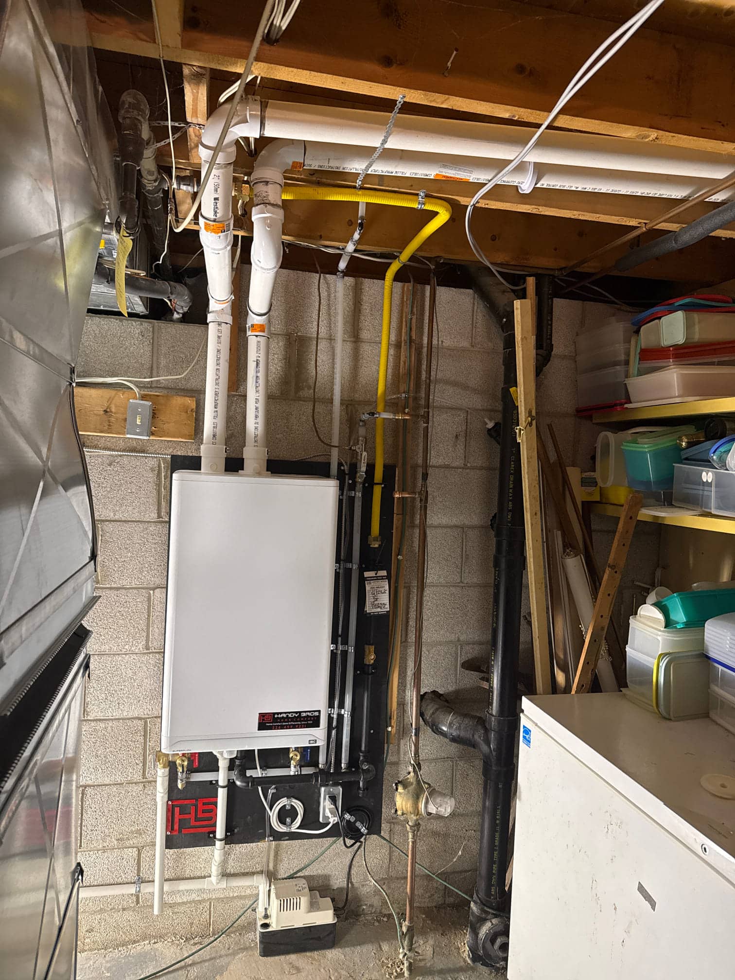 Tankless water heater installed inside a home