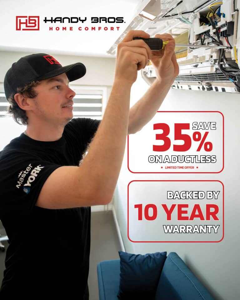 HVAC technician wearing a black cap installs or repairs a ceiling unit, with Handy Bros. Home Comfort branding and a promo offering 35% off ductless and a 10-year warranty nearby.